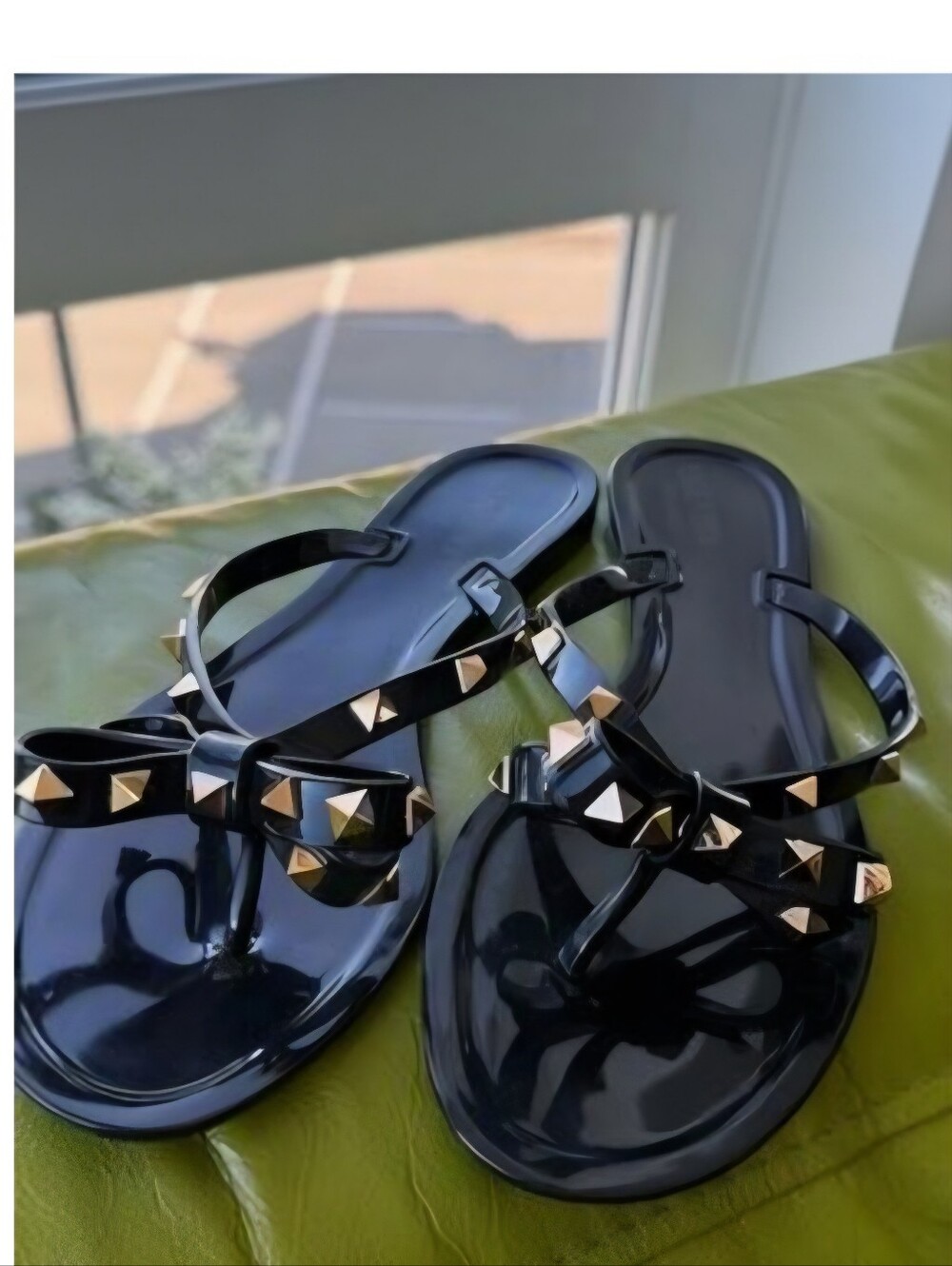 Valentino Garavani Black Jelly Thong Sandals with Gold Rockstuds